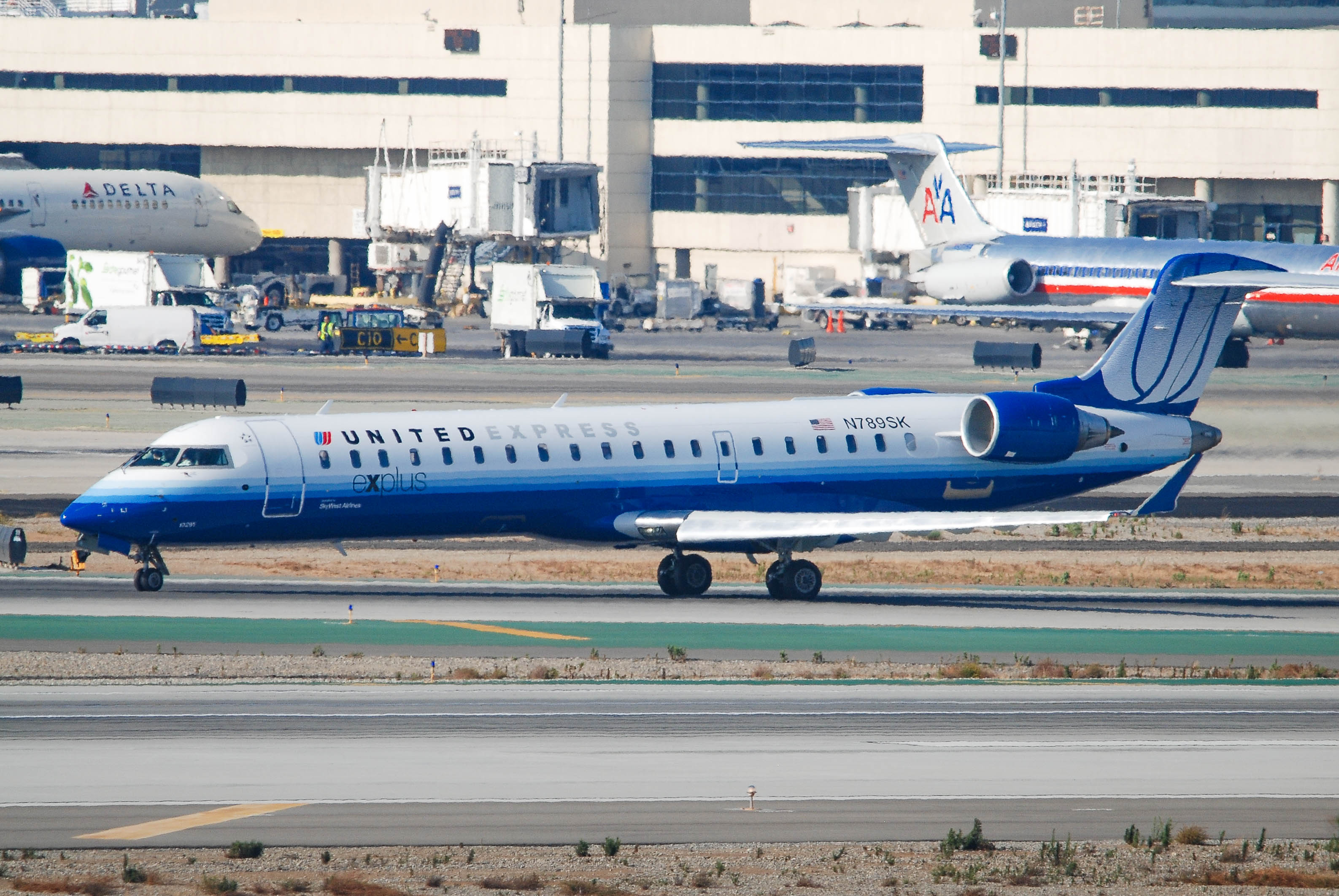 N789SK/N789SK United Express Bombardier CRJ-702ER Photo by colinw - AVSpotters.com